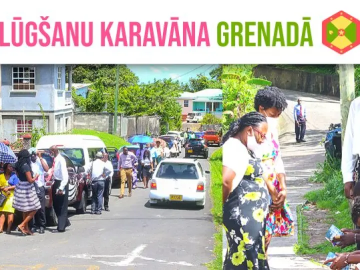 Adventisti Grenādā uzrunā vietējos pilsētas iedzīvotājus lūgšanu karavānas laikā